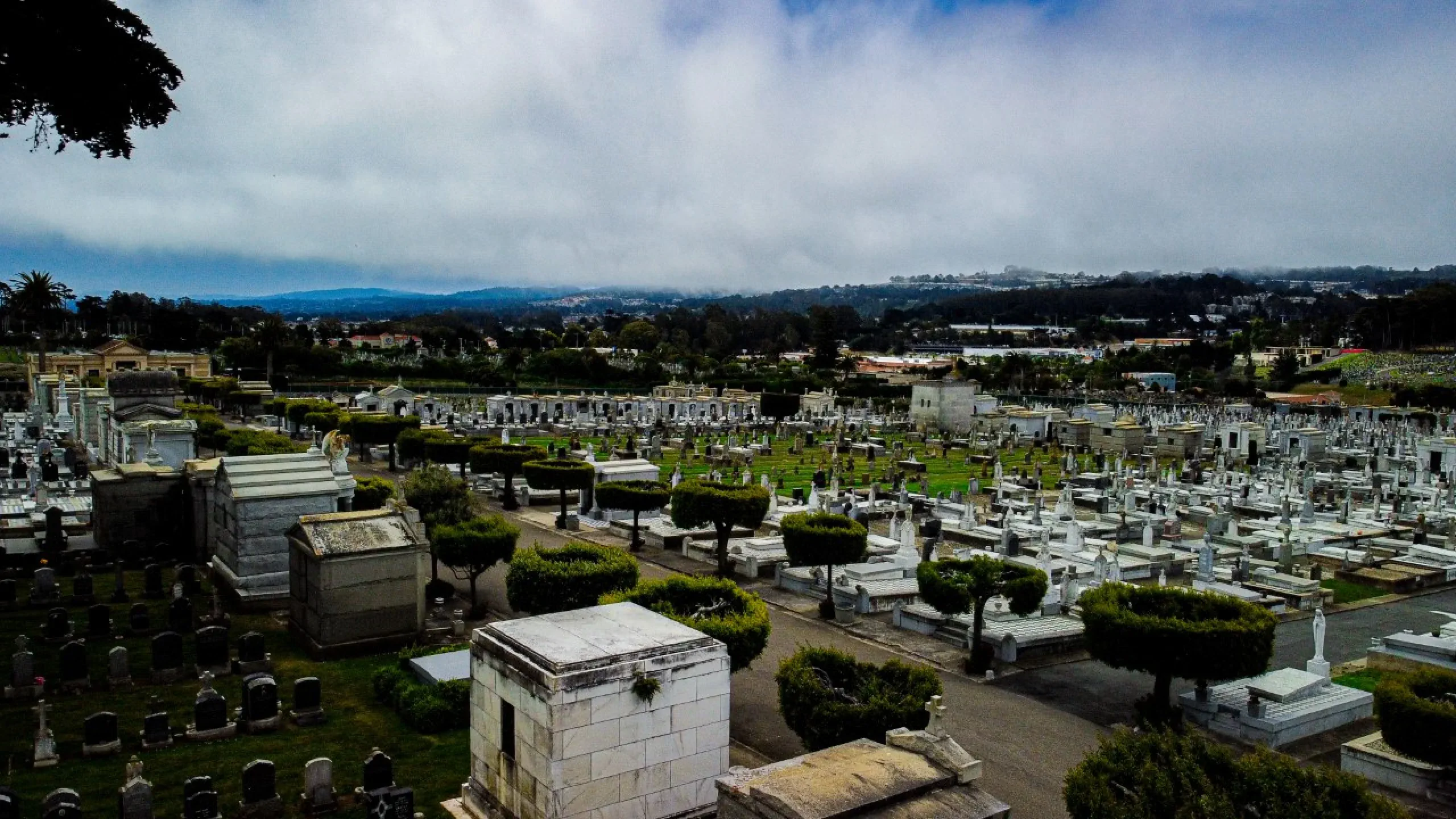 Italian-Cemetery-View Distant aerial view of the cemetery grounds on a misty day