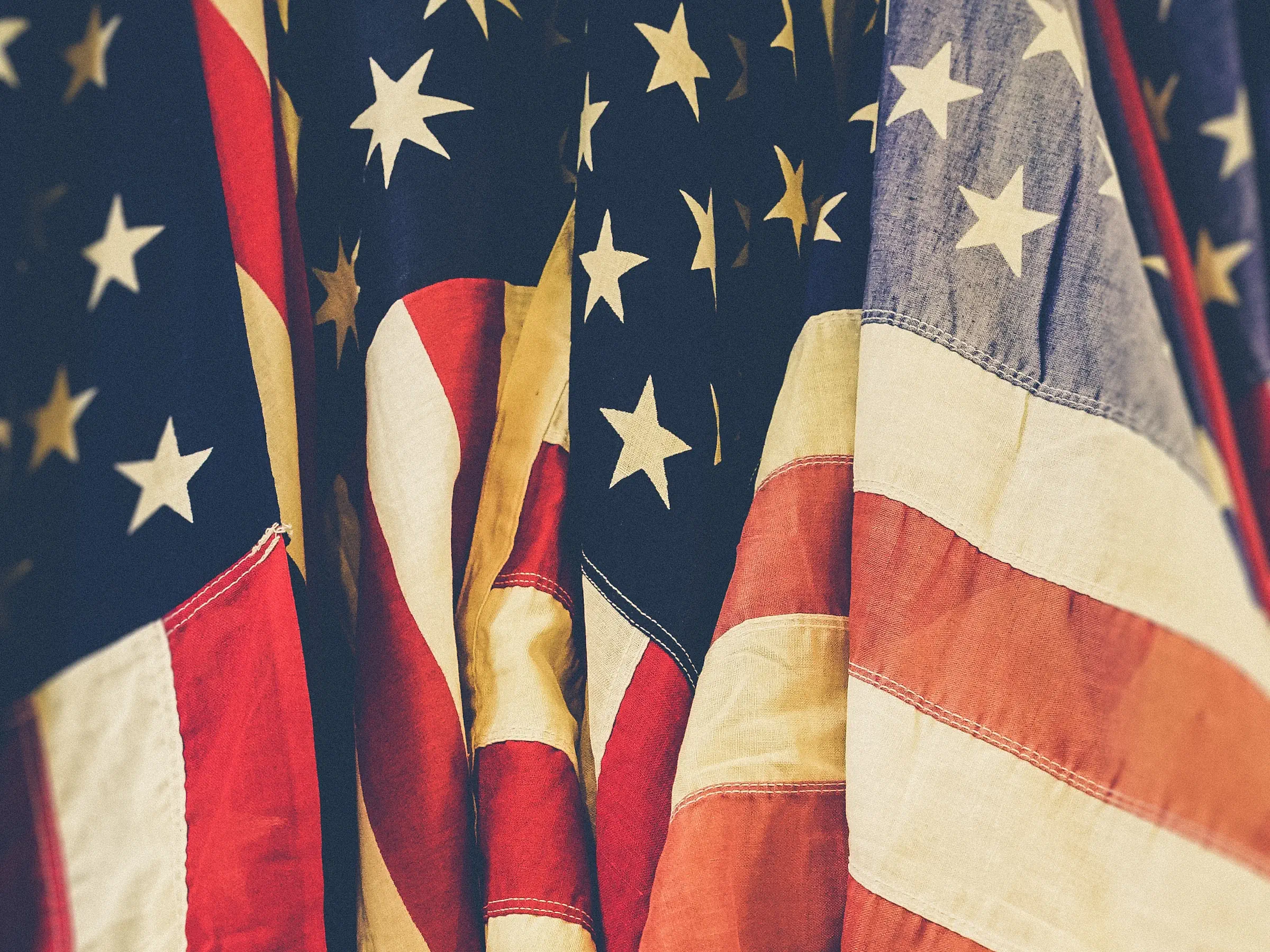 detail shot of draped American flags