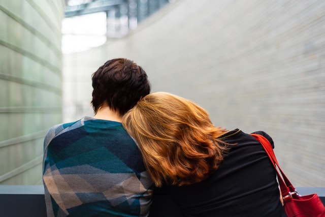 two-people-embracing-in-support-during-a-time-of-grief Two people embracing in support during a time of grief in San Bruno, CA, funeral homes provide compassionate care and guidance to help families cope and plan meaningful memorial services.